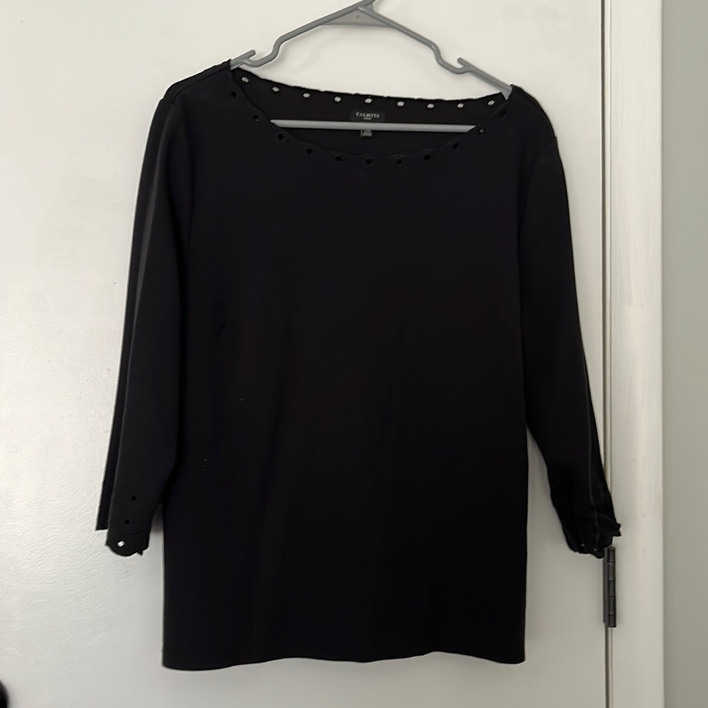 Black Talbots top with details around the neck and sleeves